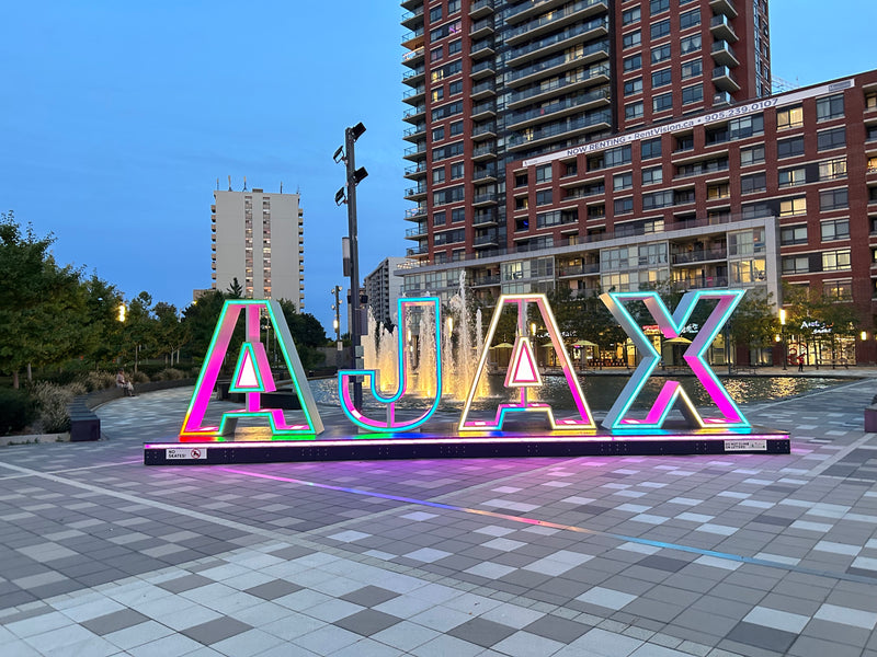 Neon AJAX sign at Pat Bayly Square, Ajax, Ontario